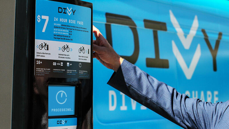 Divvy kiosk with person interaction
